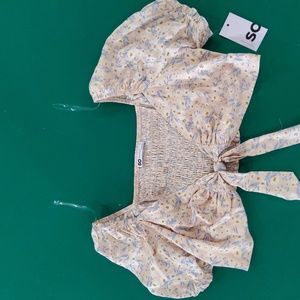 Ruffled crop tie front top